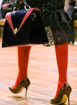 LFW_Moqueen_website_black_bag Model carrying black leather bag