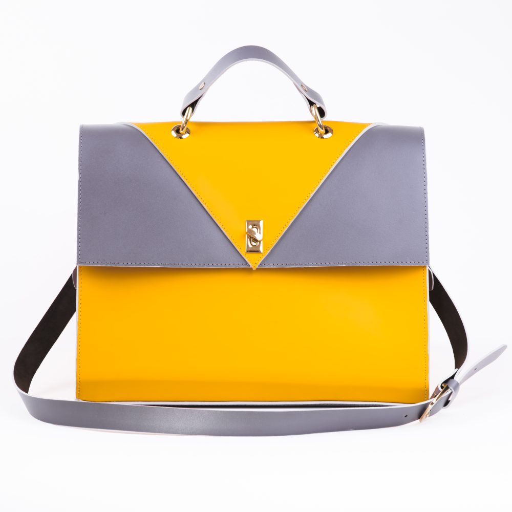 Front view of a canary yellow grey designer shoulder bag