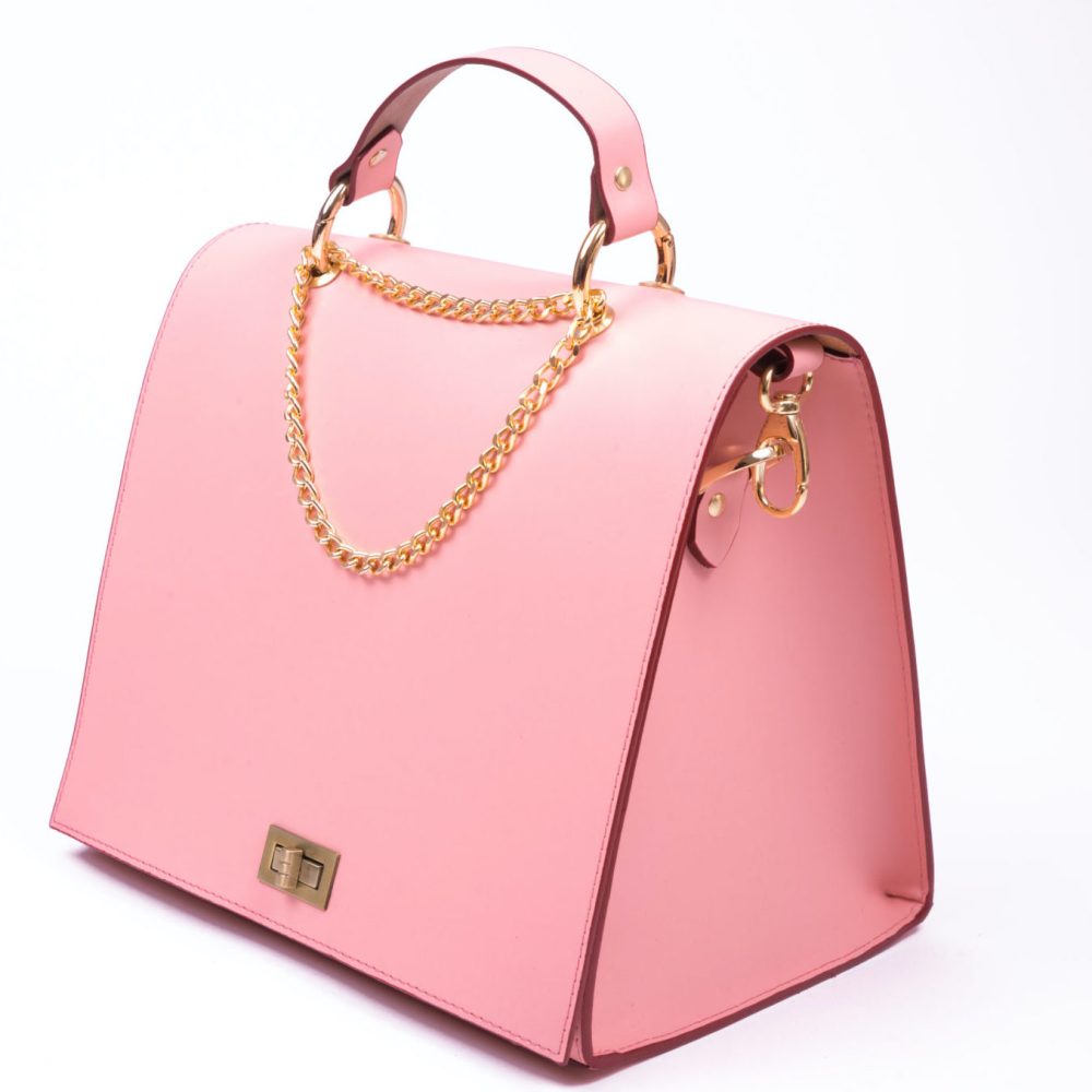 Side view of a pink bag with a chain