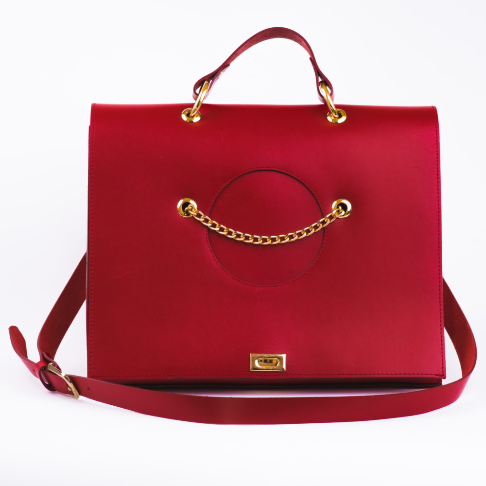 Front view of designer hand bag for sale in red