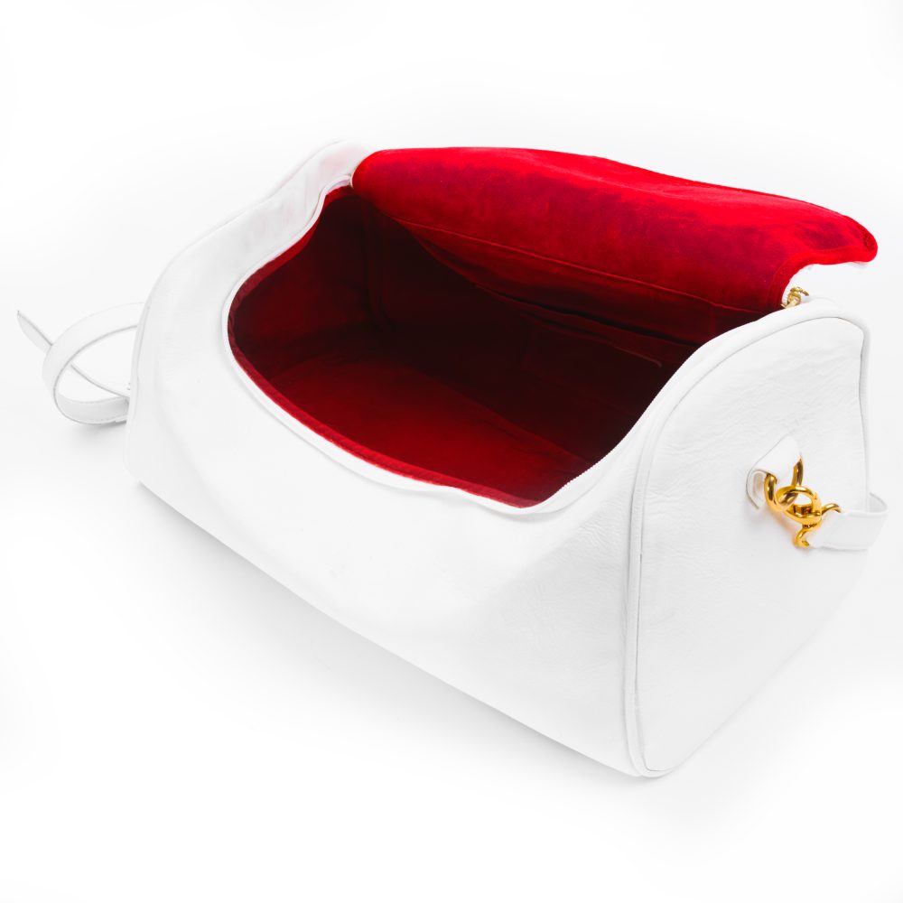 Inner of white duffle bag with red inner velvet leather