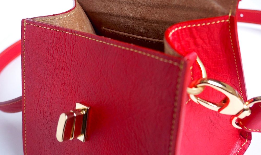 Inner of a red mini designer handbag handmade in London